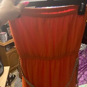 Orange strapless new never worn . No tags though